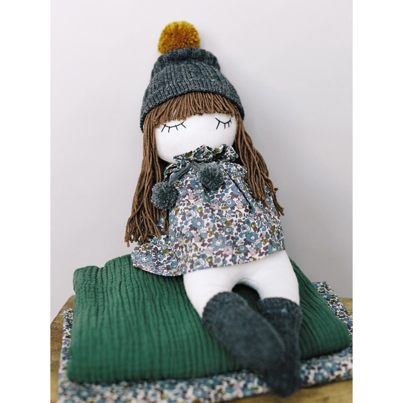 Pattern A soft doll in a...